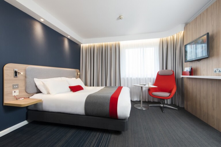 Interior of bedroom at Travelodge by Glasgow hospitality and leisure photographers Blink Imaging